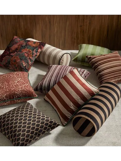 The 'Borchelli' collection offers timeless patterns like stripes, florals, and geometrics. These fabrics are my favourites for creating a classic, layered look with cushions and upholstery.