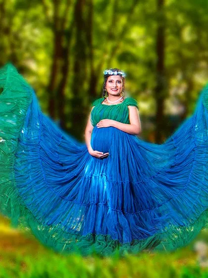 This is the kind of magical moment I love to create. Using a flowing gown in a beautiful outdoor setting, we can capture a portrait that is both powerful and serene, celebrating your journey in a truly epic way.