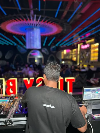 Starting a new chapter at a new venue. This shot from behind the decks captures the beginning of a great night. I'm always excited to play for a new crowd.