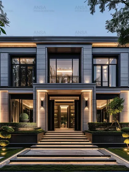 The entrance to a home sets the tone for everything inside. This grand entryway with its illuminated staircase and clean, modern lines creates an immediate impression of sophistication and style, welcoming you into a world of curated design.