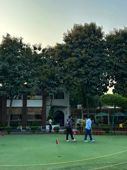 The view from our putting green towards the Hamoni Cafe. It's the perfect blend of serious practice and relaxed socializing, making it more than just a golf range.