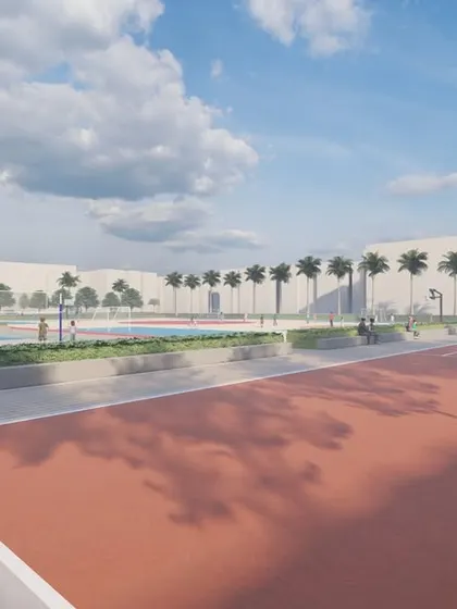 A design for the New Baldwin International School, featuring a professional running track that frames the multi-user game area, creating a comprehensive athletic facility.