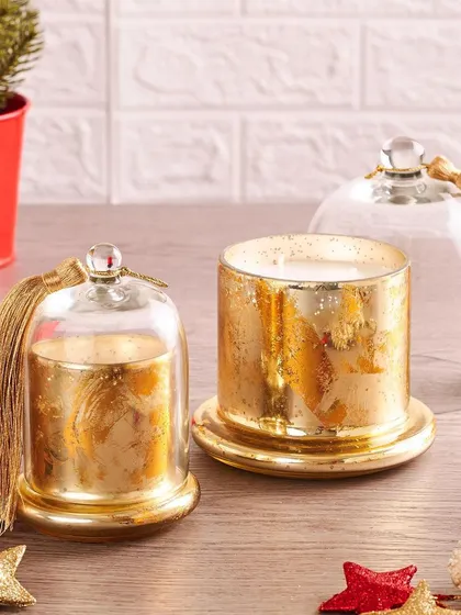A pair of my elegant bell jar candles, one with the cloche on and one off, showing the beautiful mercury glass finish.