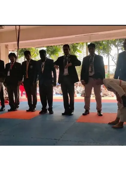 A moment of respect at our 13th Kings State Level Open Karate Championship. Two young competitors bow to the judges before their match.
