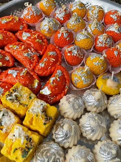 A large platter showcasing my variety of handmade mithai-shaped candles. These decorative candles, including gujiya, ladoo, and barfi shapes, are perfect for bulk orders and add a unique touch to Diwali decor.