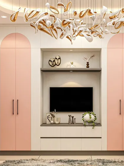 This kids' room wardrobe and TV unit combines playful design with practical storage. The pink and white cabinets with arched doors provide ample space, while the central niche is perfectly sized for a screen and decor.