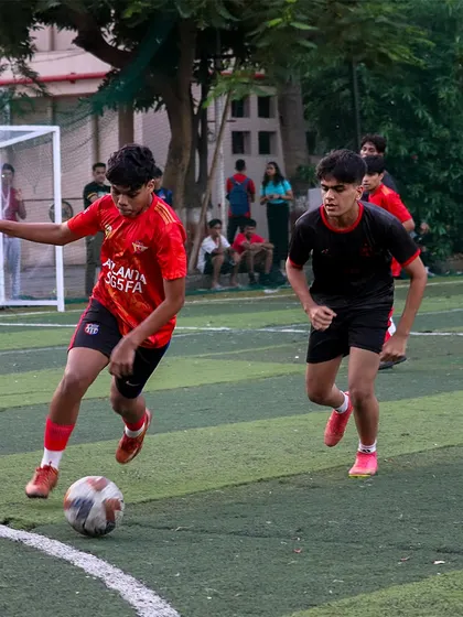 A player looking to make a pass while on the move, demonstrating quick decision-making.
