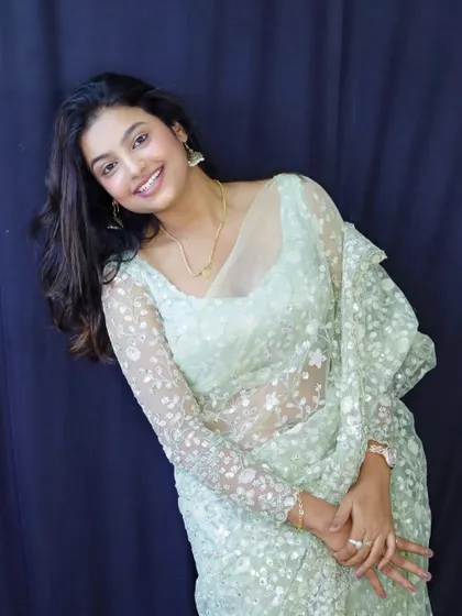 Sonu looking lovely and cheerful in the mint green sequin saree.