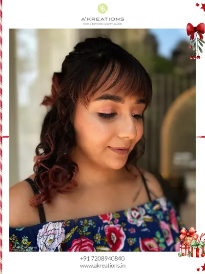 This client is ready for her Christmas celebration with a soft, romantic makeup look and a beautifully styled haircut.