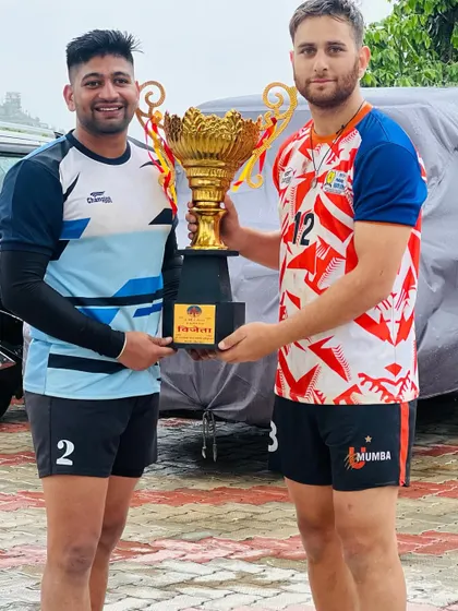 Academy players Irfan Mir and a teammate proudly display the winner's trophy from a major tournament in Himachal, which came with a prize of 51,000.