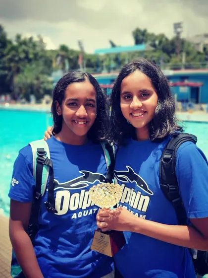 The smile of a champion. This student is proudly holding a trophy after a competition, a perfect example that consistent training and hard work truly pay off. We celebrate every victory, big or small.