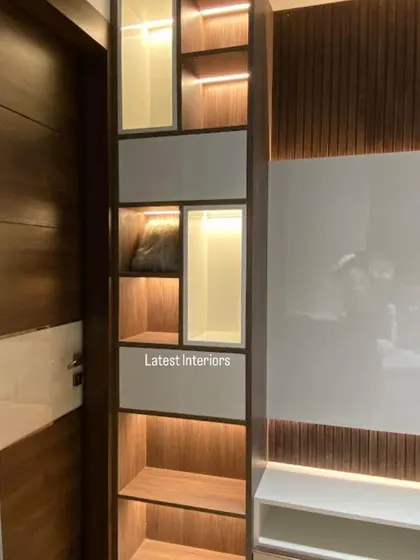 A detail shot of a custom-built display unit with integrated lighting. This is a perfect example of how I use smart design to create functional and beautiful storage solutions.