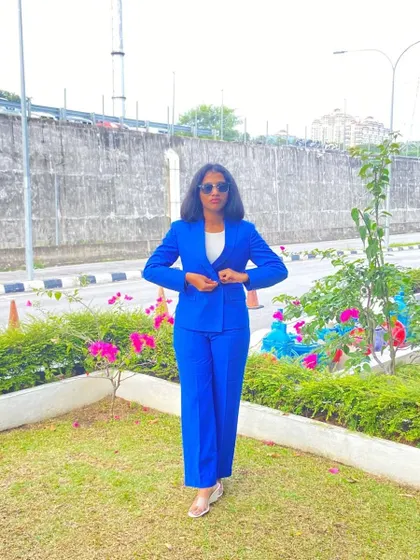 This custom blue blazer is all about power dressing. The fit is tailored to perfection.
