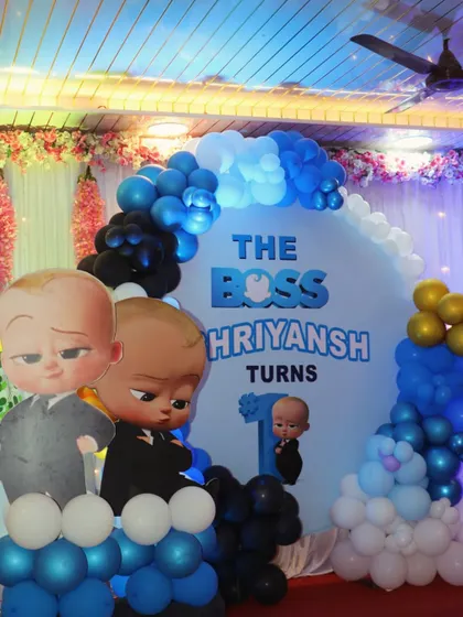 A closer look at the Boss Baby backdrop and character cutouts, showing the detail in the custom printed background.