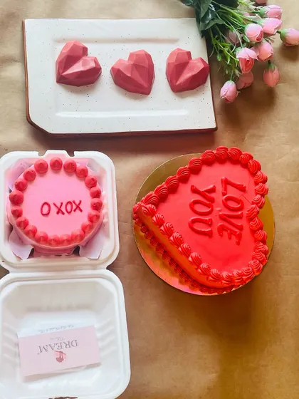 Our Valentine's special collection, featuring a heart-shaped cake, a bento cake, and geometric heart-shaped chocolates.