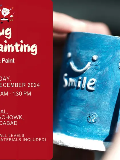 A close-up shot of a mug being painted with a "Smile" design for our December workshop, highlighting the personal and handmade touch.