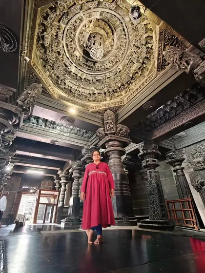 Inside the Halebidu temple, standing beneath the ornate ceiling. These spaces inspire reverence and reaffirm my connection to dance.