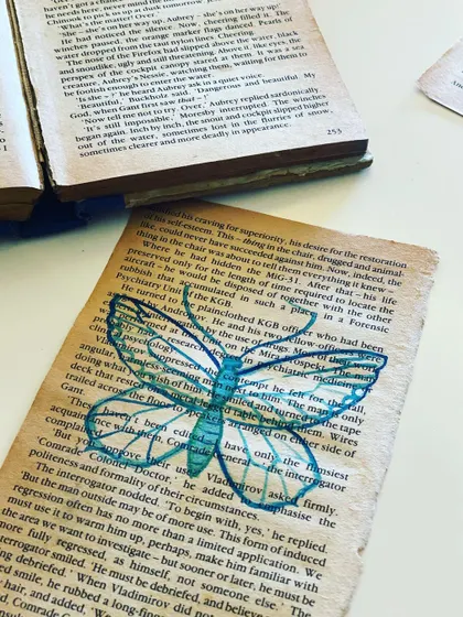 These old books were being sold by a library, full of stories but no longer read. I find it interesting to tell my own stories on these aged pages, adding a new layer of history with my embroidered butterfly.