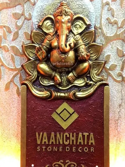 We also create custom name boards for businesses. This piece for a stone decor company features a prominent Ganesha sculpture above the brand name, creating a professional and auspicious entrance for their office or showroom.