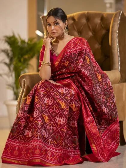 Capturing the elegance of traditional Indian attire requires a focus on detail and grace. This shot highlights the rich texture and intricate patterns of the saree, set in a luxurious indoor environment to convey a sense of timeless sophistication.