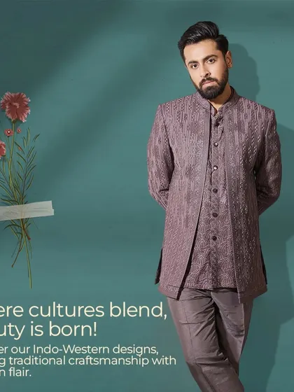 Where cultures blend, beauty is born. This mauve Indo-Western outfit, with its unique layered structure and subtle texture, infuses traditional craftsmanship with modern flair.