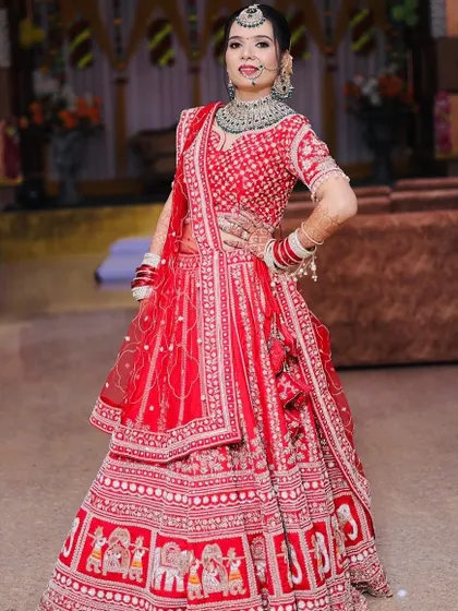 A full-length view of the bride, radiating confidence and grace.
