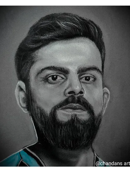 A charcoal powder portrait of cricketer Virat Kohli, highlighting his focused expression. This style is perfect for creating high-impact art of sports heroes and public figures.