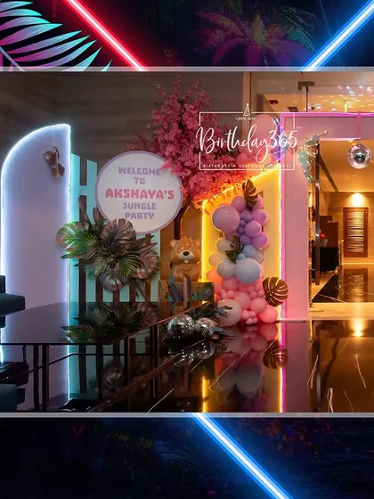 A unique twist on a popular theme: a Neon Jungle superhero party. This welcome entrance combines glowing lights, tropical plants, and superhero elements for a cool, modern vibe.