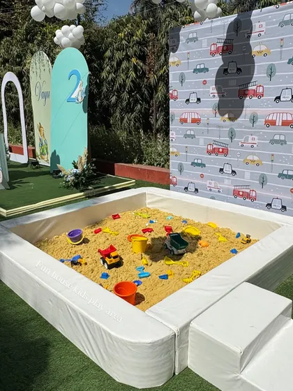 Our portable sandpit set up for an outdoor vehicle-themed birthday party. We provide clean sand and a variety of toys, offering a wonderful sensory play experience that can be placed in gardens or even indoors without any mess.