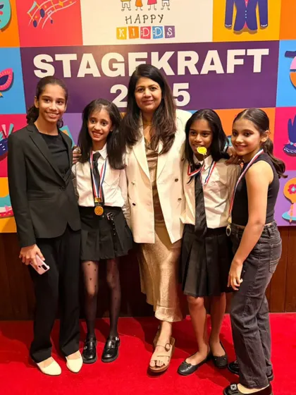 Celebrating with another group of our amazing performers. Their teamwork on stage was outstanding.