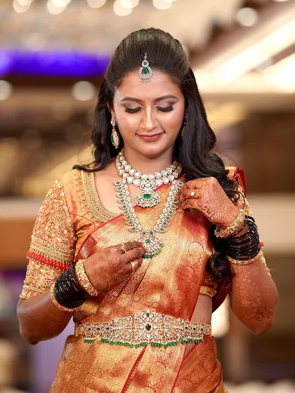 Another angle of Supriya's stunning reception look, showing how the makeup and jewellery come together to create a cohesive and elegant bridal style.