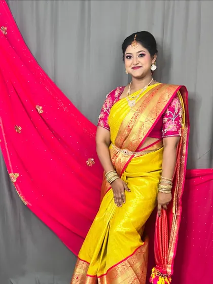 A full view of this elegant client, ready for her family function. The makeup is designed to last all day while looking fresh and radiant.