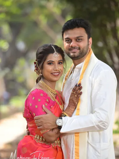 A lovely couple portrait of Santhoshi and her husband. We provided a light touch-up for the groom as well, ensuring they both looked flawless in their wedding photos.