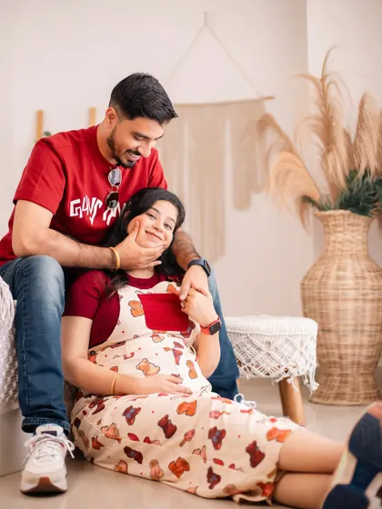 A relaxed and loving portrait of the couple in our casual studio setting.