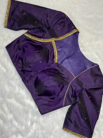 The front view of the minimalist purple blouse, perfect for any special occasion.