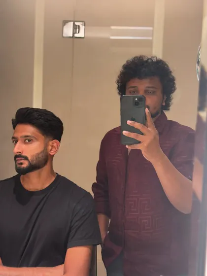 Styling Khaleel Ahmed. We decided on a clean, faded look that complements his features.