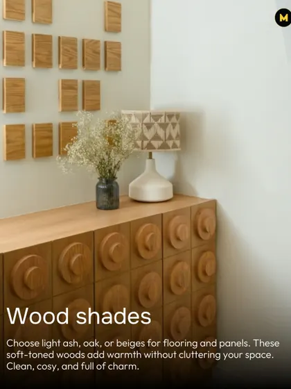 For a Japandi look, choose light wood shades like ash, oak, or beige for flooring and panels. These soft-toned woods add warmth without cluttering your space, keeping it clean and cozy.