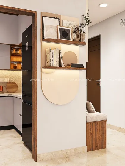 A clever partition unit with built-in shelving and seating. This custom piece helps define the space between the kitchen and living area while adding functional storage.