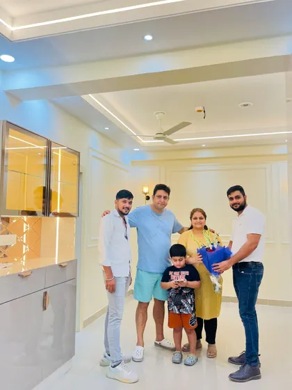 A happy handover moment with a family at a Saviour Greenarch project. It's always a pleasure to see our clients so happy in their new home.