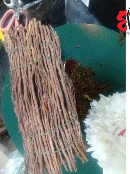 Prepping for a Christmas workshop with natural elements. These dried sticks will be used to create a rustic and festive structure for a holiday-themed floral arrangement.