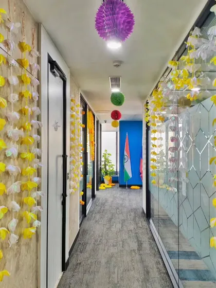 Even the office corridors are part of the celebration. I used hanging flower strings and paper lanterns to brighten up the passageway for Diwali.