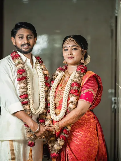 Holding hands and ready for their future. The groom's look is confident and understated.
