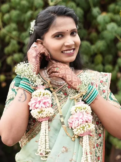 Floral kalire are not just for weddings. This mom-to-be chose to wear them for her baby shower, adding a unique and traditional element to her celebration.