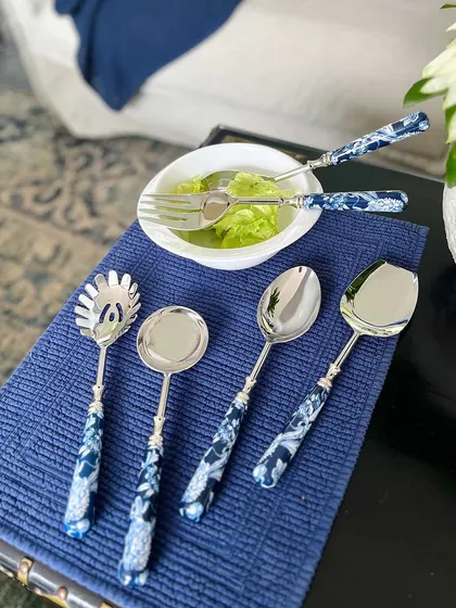 Up your dinner game with our sleek serving spoon set. This collection, featuring beautiful blue and white printed handles, includes everything you need to serve curries, noodles, and salads in style.