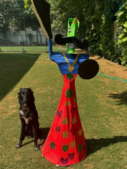 Shifu posing with a handmade Ravan effigy during our Dussehra celebrations.