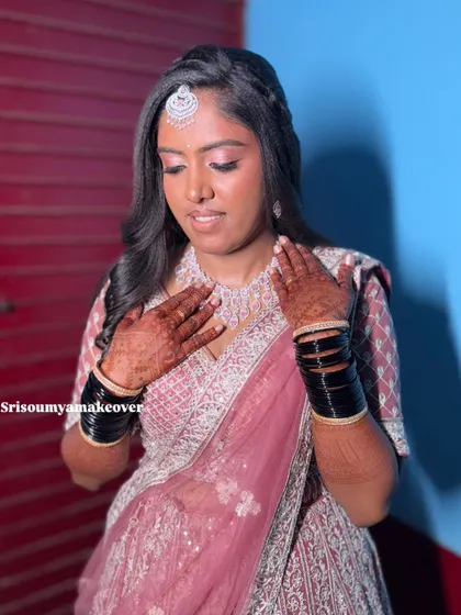 Another beautiful shot of Vaani's reception style. The soft curls and glowing makeup created a look that was both timeless and modern.
