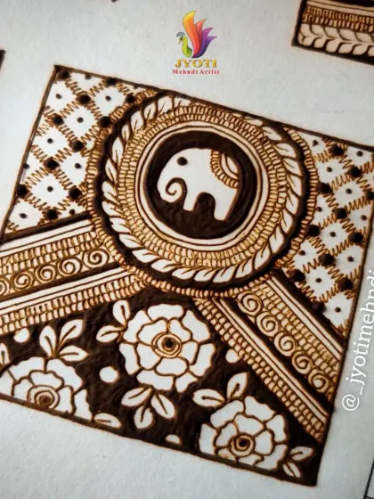A design concept featuring a central elephant motif surrounded by floral and geometric patterns.