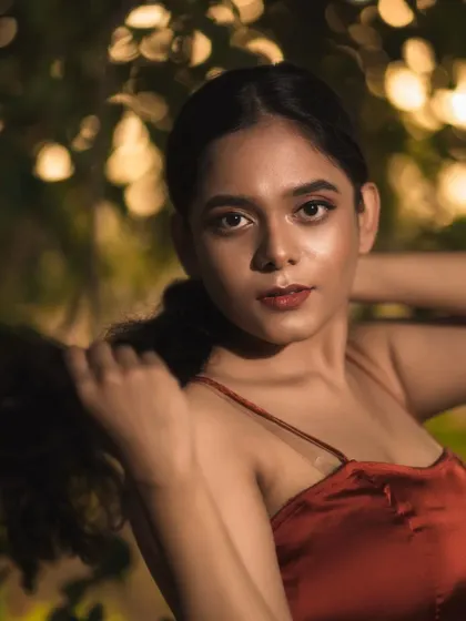 A close-up portrait from our golden hour shoot. The soft, warm light and the bokeh in the background come together to create a really magical, film-like quality.