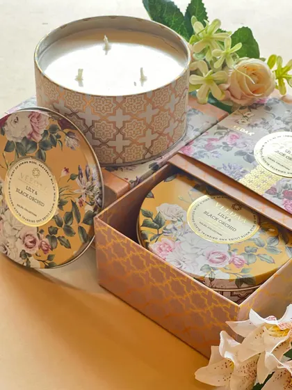 Our popular three-wick tin candles, like this Lily & Black Orchid fragrance, now come in bespoke gift boxes. It's the same product you love, with an all-new packaging experience.
