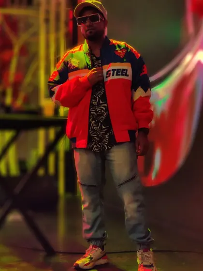 A full-length shot showing off a retro, colorful jacket, perfect for a themed party.